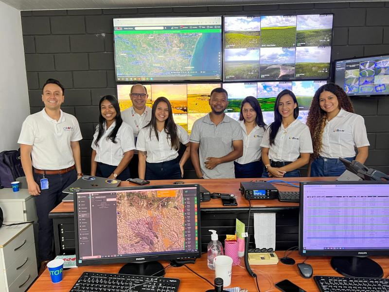 OroraTech Customer Success Lead Camilo Pabon &amp; Account Manager Daniel Santos training Suzano staff on our Wildfire Solution platform in Mucuri, Bahia.